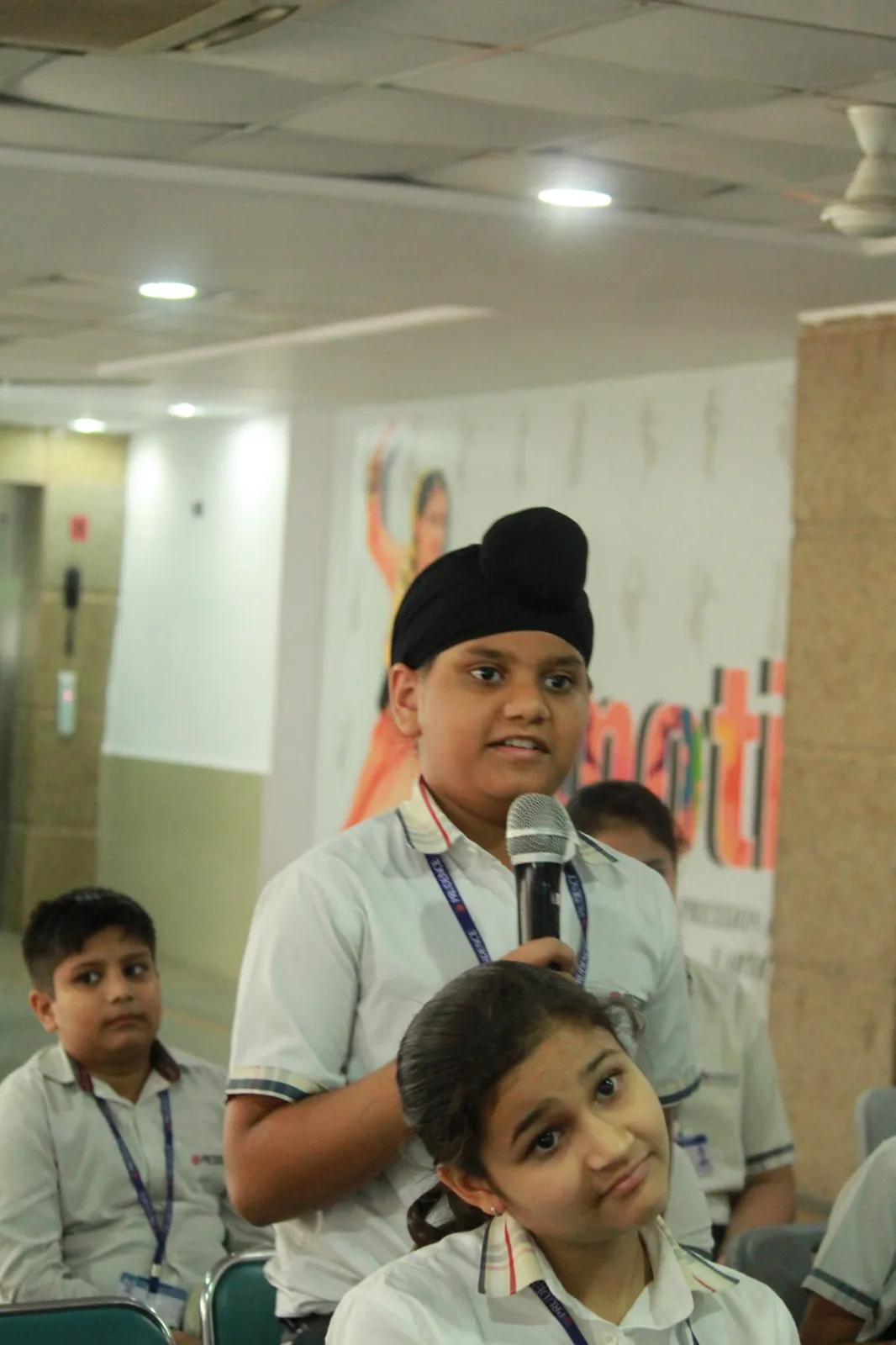 A student speaking up during a session
