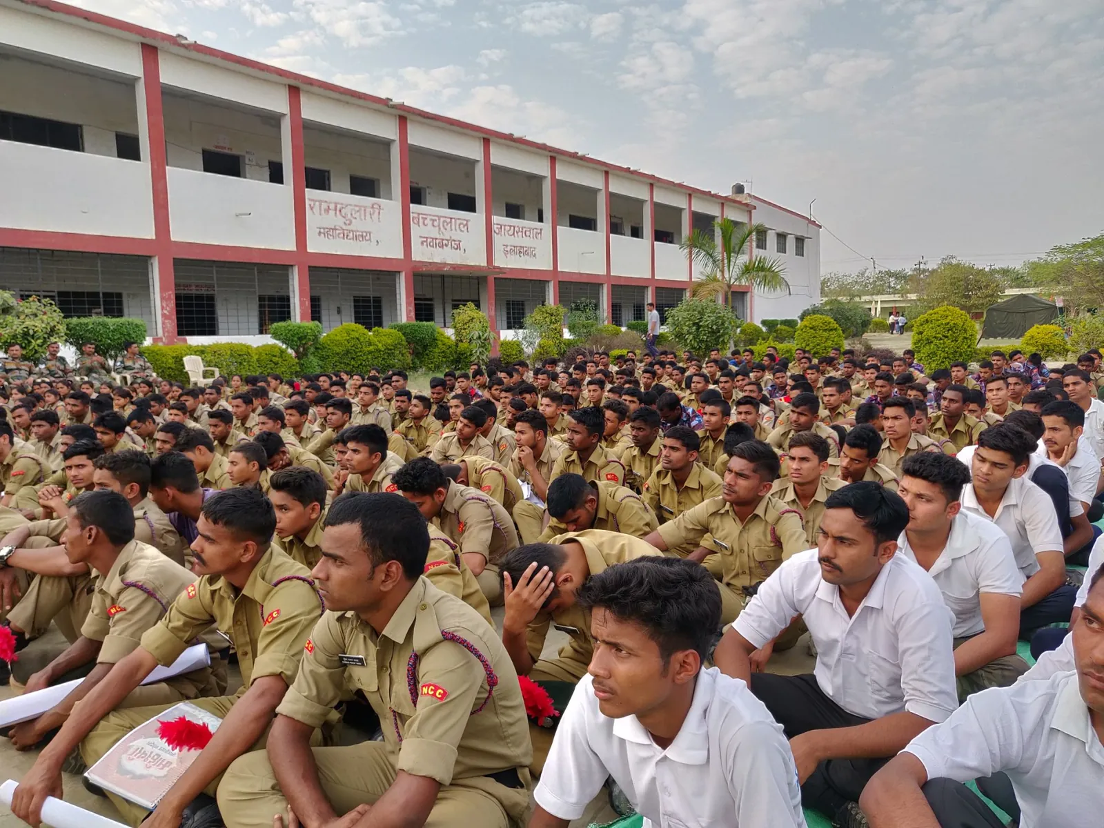 Hundreds of NCC cadets seated in front of Ramdulari Bachchulal Jaiswal Mahavidyalaya, Nawabganj, Allahabad