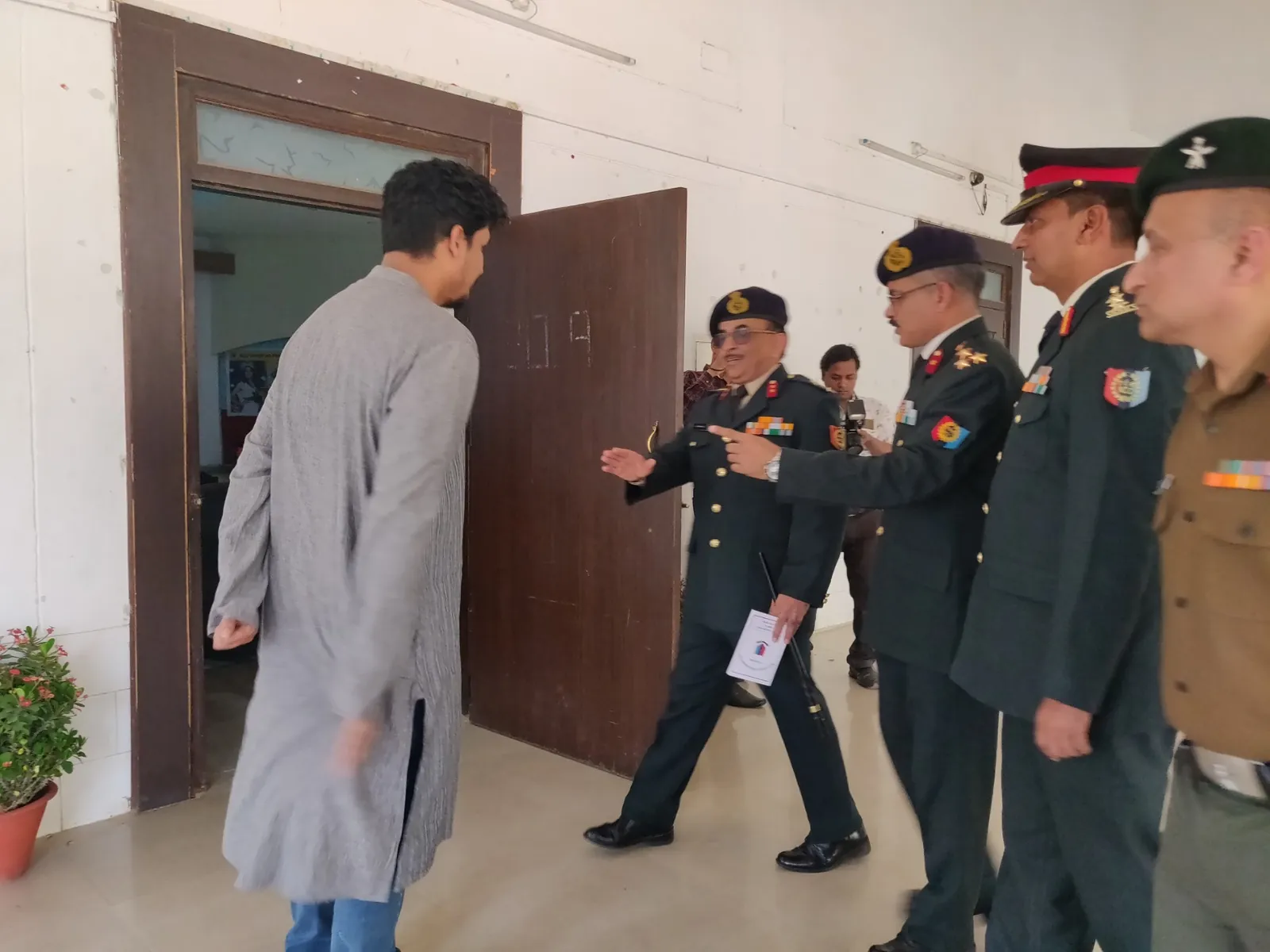Senior Army officers arriving at the camp