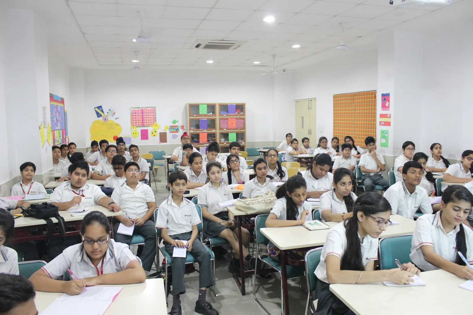 Students responding to the survey in a classroom